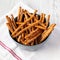 Baked Pretzel Sesame Sticks in a Bowl, low angle view