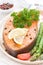 Baked salmon with asparagus, parsley and lemon, vertical