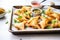 baked samosas on parchment paper in a baking tray