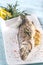 Baked sea bass with lemon and rosemary