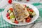 Baked seabass with Greek salad