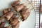 Baked on skewers turkey hearts in spices