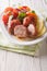 Baked spicy rabbit fillet and fresh salad of tomatoes, peppers,