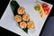 Baked Sushi Roll with perch, salmon and spicy scallops