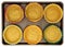 Baked tart crust on baking pan in silicone cups