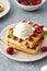 Baked traditional Belgium waffles with ice cream and cherries. Breakfast.