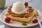 Baked traditional Belgium waffles with ice cream and cherries. Breakfast.