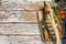 Baked Zander, walleye fish with herbs and lemon. White wooden background. Top view. Copy space