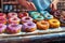 baker artfully placing donuts at the National Donut Day