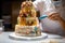 A baker assembling layers of a multi-tiered wedding cake, showcasing expertise in creating stunning confections. Generative AI