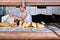 Baker cooking bread at a traditional bakehouse