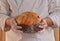 Baker holding panettone