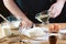 Baker knead dough bread, pizza or pie recipe ingredients with hands, food on kitchen table background, working with milk, yeast, f