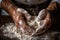 baker kneading dough, hands covered in flour