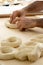 Baker making frisella bread