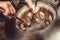 Baker making turkish pita bread in tandoor clay oven. Baking process