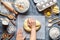 Baker mixing dough bread, pizza or pie recipe ingridients, food flat lay