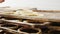 Baker morning, puts seed covered bagels on the baking trays. Entrepreneur