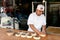 Baker prepair bread in Boudin Bakery in San Francisco - Californ