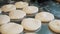 A baker prepares fresh breads and cakes.