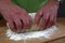 Baker preparing some dough ready to bake some bread