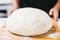 Baker\\\'s finesse: Skilled hands expertly knead dough, the foundation of delicious homemade bread