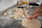 Baker shaping dough