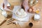 Baker sprinkle the dough with flour bread, pizza or pie recipe ingredients with hands, food on kitchen table background, working w