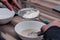 Baker sprinkle the dough with white flour bread