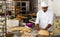 Baker at work - making sweet buns with dough