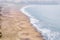 Bakers Beach aerial view over Californian sandy beach near San Francisco Bay, Pacific Ocean, gorgeous seascape in light mist,