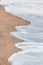 Bakers Beach aerial view over Californian sandy beach near San Francisco Bay, Pacific Ocean, gorgeous seascape, in light mist,