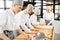 Bakers forming dough for baking at the manufacturing