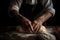 bakers hands shaping dough into artisan loaf