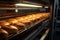 Bakery conveyor delivers fresh bread, a symphony of delicious aromas