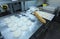 At the bakery: formed and floured dough placed on the work table