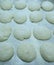 At the bakery: formed and floured dough placed on the work table