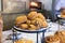 bakery goods displayed on little cafe`s counter