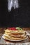 Bakery or homemade cuisine. Homemade pancakes closeup on a wooden table. Rustic style, Russian pancakes, Shrovetide, Mardi Gras