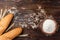 Bakery products on dark wooden. Baguette, toast bread, crispbreads and bread.