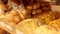 Bakery products packed in cellophane bags lie on a tray, closeup