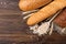 Bakery products on wooden. Baguette, toast bread, crispbreads and bread.