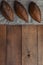 Bakery rustic crusty loaves of bread on wooden background