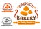 Bakery shop sign with buns and rolling pin