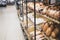 Bakery showcase. Freshly baked bread. Presentation of bread in a shop window of a hypermarket