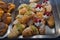 Bakery stand of pastry including Italian croissants with white cream, pistachio and berries