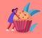 Bakery and Sweet Food Concept. Tiny Woman Holding Huge Cupcake with Chocolate Sprinkles. Pastry Muffin