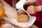 Bakery Worker Wrapping Bread At Counter