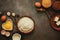 Baking background. Ingredients variety for cooking dough on a dark rustic table. The recipe for making chocolate cake and cookies