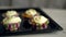 Baking cupcakes. Cupcakes on baking tray. Sweet cupcakes. Sweet food